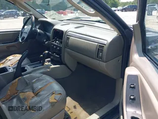 2002 Jeep Grand Cherokee Laredo with VIN 1J8GW48SX2C270339, listed as a IAAI auction lot 42390842 with Not provided miles and . Bid and sale history available at DreamBid. Image 5.