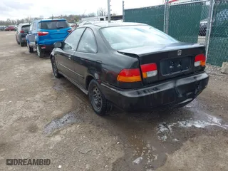 1997 Honda Civic EX with VIN 1HGEJ8242VL044722, listed as a IAAI auction lot 42045941 with 266,481 mi miles. Bid and sale history available at carsss.com. Image 3.
