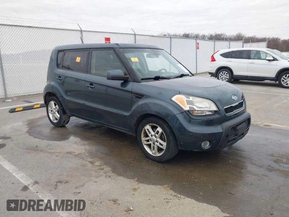 2011 Kia Soul + with VIN KNDJT2A24B7258457, listed as a IAAI auction lot 41751948 with 217,667 mi miles. Bid and sale history available at carsss.com. Image 1.