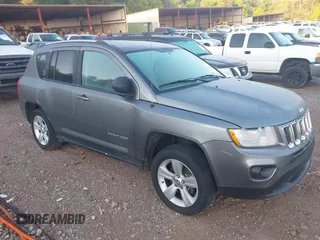 2011 Jeep Compass Latitude with VIN 1J4NT1FB4BD260158, listed as a IAAI auction lot 42013286 with 326,493 mi miles. Bid and sale history available at carsss.com. Image 1.