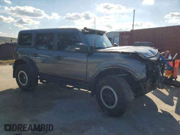 2022 Ford Bronco with VIN 1FMEE5DH1NLB82717, listed as a Copart auction lot 83230614 with 21,593 mi miles and Salvage Title. Bid and sale history available at DreamBid. Image 4.