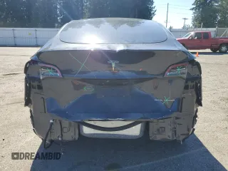 2024 Tesla Model Y Long Range with VIN 7SAYGDEE9RF120729, listed as a Copart auction lot 57360265 with 21,589 mi miles and Salvage title. Bid and sale history available at DreamBid. Image 6.