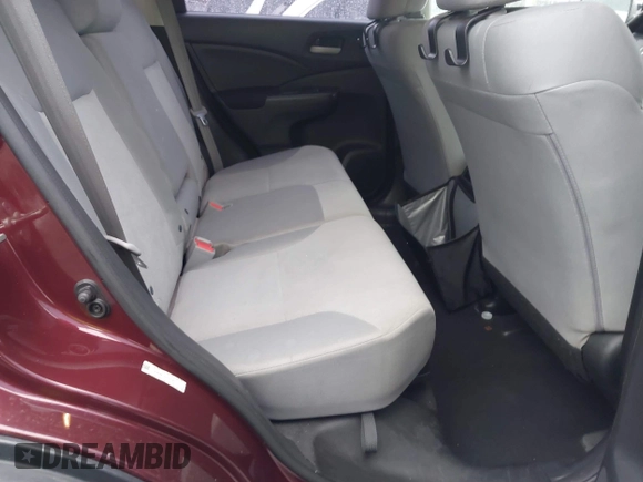 2015 Honda CR-V LX with VIN 2HKRM4H37FH695347, listed as a IAAI auction lot 41124018 with 117,400 mi miles and . Bid and sale history available at DreamBid. Image 8.