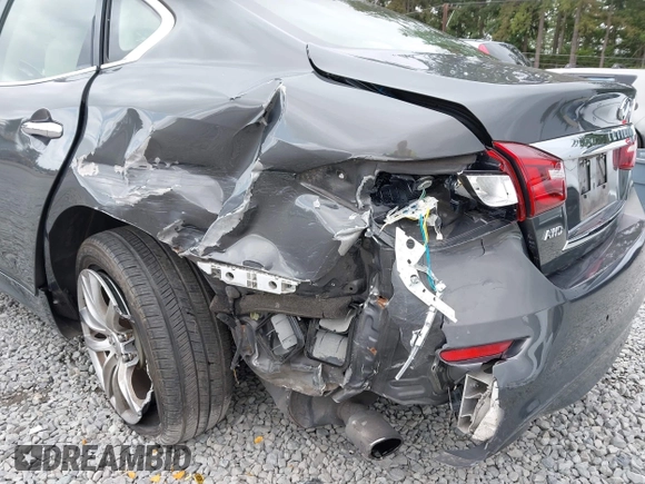 2015 Infiniti Q70 with VIN JN1BY1ARXFM562111, listed as a IAAI auction lot 42473521 with 123,212 mi miles and . Bid and sale history available at DreamBid. Image 6.