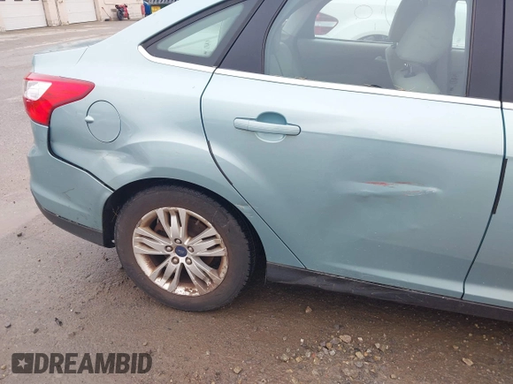 2012 Ford Focus SEL with VIN 1FAHP3H29CL430964, listed as a IAAI auction lot 42186057 with 122,279 mi miles. Bid and sale history available at carsss.com. Image 6.