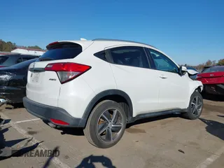 2021 Honda HR-V EX with VIN 3CZRU6H5XMM750887, listed as a IAAI auction lot 40983288 with 56,482 mi miles. Bid and sale history available at carsss.com. Image 4.