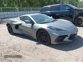 2024 Chevrolet Corvette 2LT z VIN 1G1YB2D43R5105307, wystawiony jako IAAI lot #42060470 z przebiegiem 9400 mil mil oraz . Historia ofert i sprzedaży dostępna na DreamBid. Obrazek 1.