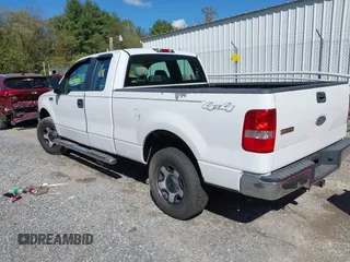 2007 Ford F-150 STX with VIN 1FTRX14W87FA14579, listed as a IAAI auction lot 40503694 with 164,718 mi miles. Bid and sale history available at carsss.com. Image 3.