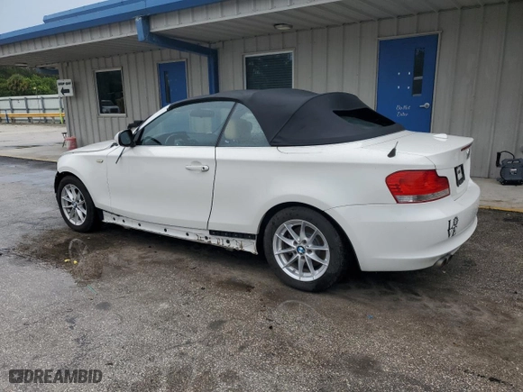 2011 BMW 1 Series 128i with VIN WBAUN1C5XBVH82605, listed as a Copart auction lot 73457334 with 94,969 mi miles and Salvage Title. Bid and sale history available at carsss.com. Image 2.
