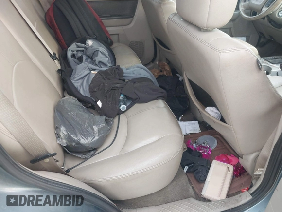 2010 Mercury Mariner with VIN 4M2CN8B76AKJ26340, listed as a IAAI auction lot 42260739 with 196,610 mi miles and . Bid and sale history available at DreamBid. Image 8.