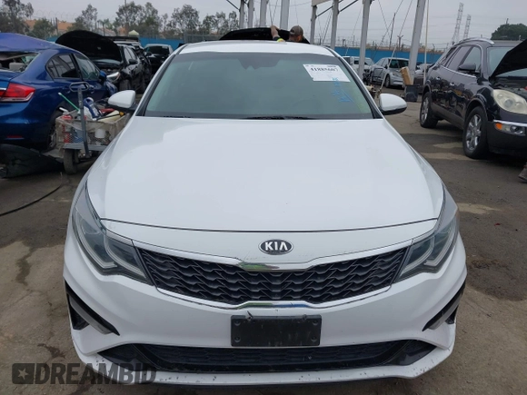 2019 Kia Optima LX with VIN 5XXGT4L36KG371801, listed as a IAAI auction lot 41885607 with 150,043 mi miles. Bid and sale history available at carsss.com. Image 12.