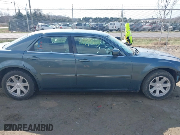 2005 Chrysler 300 with VIN 2C3JA53G35H157178, listed as a IAAI auction lot 41849007 with 149,247 mi miles. Bid and sale history available at carsss.com. Image 12.