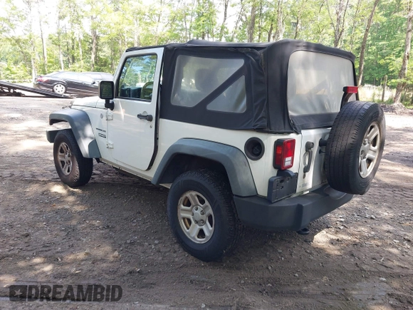 2012 Jeep Wrangler Sport with VIN 1C4AJWAG7CL192200, listed as a IAAI auction lot 42472398 with 198,999 mi miles and . Bid and sale history available at DreamBid. Image 3.