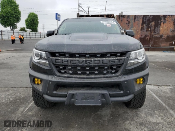 2021 Chevrolet Colorado 4WD ZR2 with VIN 1GCGTEEN3M1293299, listed as a Copart auction lot 59809995 with 21,890 mi miles and Salvage title. Bid and sale history available at DreamBid. Image 5.