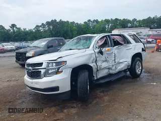 2019 Chevrolet Tahoe LT with VIN 1GNSKBKC3KR144850, listed as a IAAI auction lot 42420199 with Not provided miles and . Bid and sale history available at DreamBid. Image 2.
