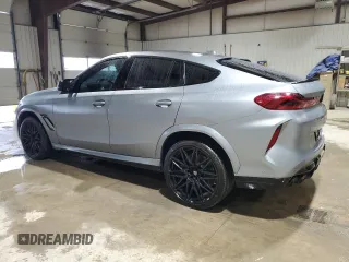 2024 BMW X6 M with VIN 5YM23ET0XR9U26576, listed as a Copart auction lot 86698164 with 6,669 mi miles and Salvage Title. Bid and sale history available at carsss.com. Image 2.