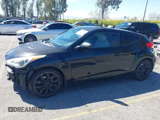 2013 Hyundai Veloster w/Black Int z VIN KMHTC6AD7DU173310, wystawiony jako IAAI lot #41881799 z przebiegiem 147 034 mil mil oraz . Historia ofert i sprzedaży dostępna na DreamBid. Obrazek 15.