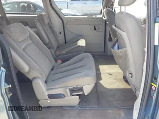 2005 Dodge Caravan SXT with VIN 2D8GP44L55R130702, listed as a IAAI auction lot 42090867 with 232,655 mi miles and . Bid and sale history available at carsss.com. Image 8.