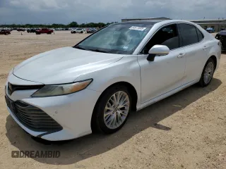 2018 Toyota Camry XSE with VIN 4T1BZ1HK7JU014865, listed as a Copart auction lot 54677005 with 117,179 mi miles and Salvage title. Bid and sale history available at DreamBid. Image 1.