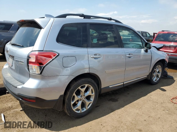 2017 Subaru Forester Touring with VIN JF2SJAWC7HH487015, listed as a Copart auction lot 59976615 with 97,218 mi miles and Salvage title. Bid and sale history available at DreamBid. Image 3.