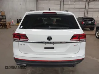 2021 Volkswagen Atlas SE z VIN 1V2HR2CA3MC539997, wystawiony jako IAAI lot #41977786 z przebiegiem 77 372 mil mil oraz . Historia ofert i sprzedaży dostępna na DreamBid. Obrazek 17.