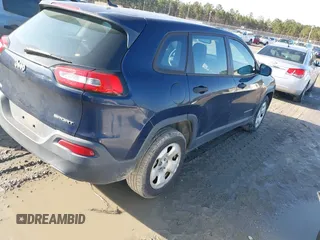2015 Jeep Cherokee Sport with VIN 1C4PJLAB2FW547371, listed as a IAAI auction lot 41588682 with 135,640 mi miles. Bid and sale history available at carsss.com. Image 4.