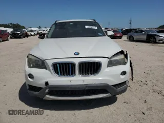 2013 BMW X1 28i z VIN WBAVM1C50DVW41615, wystawiony jako Copart lot #51329525 z przebiegiem 120 642 mil mil oraz Szkoda całkowita • Salvage title. Historia ofert i sprzedaży dostępna na DreamBid. Obrazek 5.