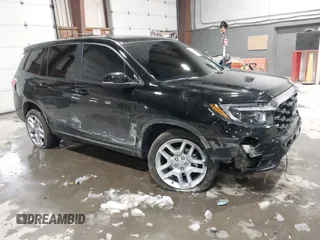2025 Honda Passport EX-L z VIN 5FNYF8H54SB010454, wystawiony jako IAAI lot #41569333 z przebiegiem 4592 mil mil oraz . Historia ofert i sprzedaży dostępna na DreamBid. Obrazek 1.