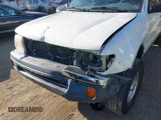 1998 Toyota Tacoma with VIN 4TAWN72N3WZ103586, listed as a IAAI auction lot 40908635 with 197,024 mi miles and . Bid and sale history available at DreamBid. Image 6.