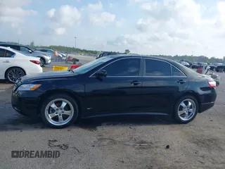 2008 Toyota Camry LE z VIN 4T1BE46K98U248029, wystawiony jako IAAI lot #42228084 z przebiegiem 108 006 mil mil oraz . Historia ofert i sprzedaży dostępna na DreamBid. Obrazek 14.