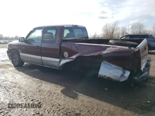 1999 GMC New Sierra 1500 SLE with VIN 2GTEC19TXX1543015, listed as a Copart auction lot 85465164 with 144,396 mi miles and Salvage Title. Bid and sale history available at carsss.com. Image 2.