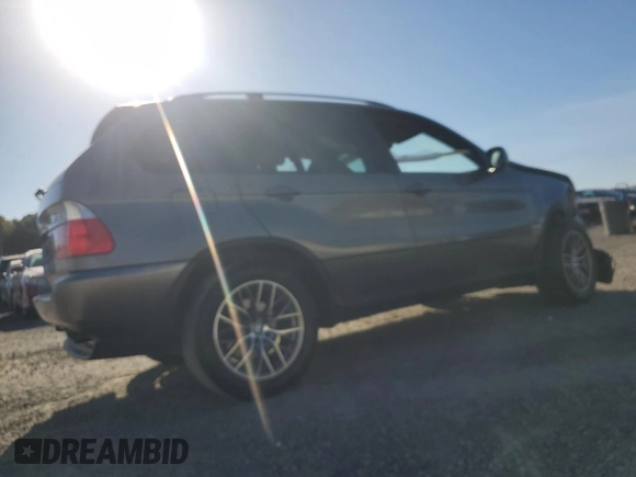 2005 BMW X5 4.4i with VIN 5UXFB53565LV15453, listed as a Copart auction lot 75830774 with 148,211 mi miles and Salvage Title. Bid and sale history available at carsss.com. Image 3.