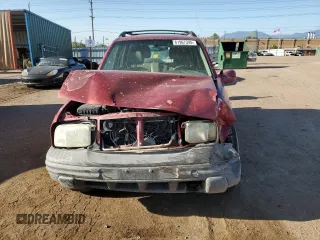2001 Chevrolet Tracker LT z VIN 2CNBJ634716945832, wystawiony jako Copart lot #61967345 z przebiegiem 136 403 mil mil oraz Szkoda całkowita • Salvage title. Historia ofert i sprzedaży dostępna na DreamBid. Obrazek 5.