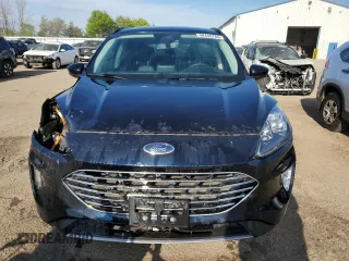 2021 Ford Escape Titanium Hybrid с VIN 1FMCU9DZ2MUA10439, выставлен на аукционе Copart как лот 58440785 с пробегом 84 803 миль миль и Списание • Salvage title. История ставок и продаж доступна на DreamBid. Изображение 5.
