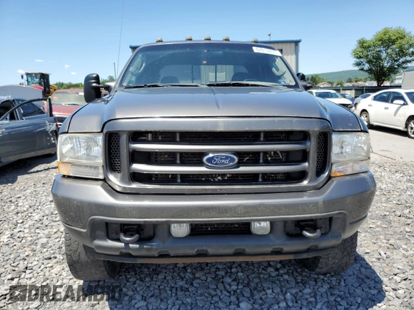 2004 Ford F-250 XL with VIN 1FTNW21L14EA16600, listed as a Copart auction lot 62814805 with 222,493 mi miles and Salvage title. Bid and sale history available at DreamBid. Image 5.