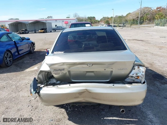 2003 Mazda Protege DX with VIN JM1BJ225731212628, listed as a IAAI auction lot 41374927 with 105,662 mi miles. Bid and sale history available at carsss.com. Image 17.