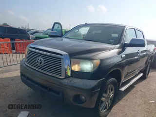 2011 Toyota Tundra Limited with VIN 5TFFY5F16BX107242, listed as a IAAI auction lot 42079406 with 201,000 mi miles and . Bid and sale history available at DreamBid. Image 2.