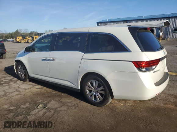 2014 Honda Odyssey EX-L with VIN 5FNRL5H61EB005740, listed as a Copart auction lot 54663595 with 118,971 mi miles and Salvage Title. Bid and sale history available at DreamBid. Image 2.
