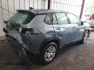 2022 Toyota Corolla Cross L with VIN 7MUAAAAG9NV034659, listed as a IAAI auction lot 42125356 with 14,631 mi miles and . Bid and sale history available at DreamBid. Image 4.