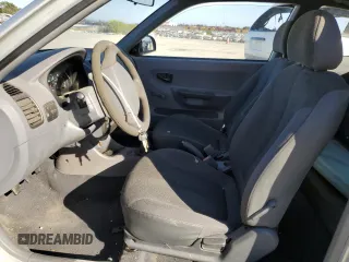 2002 Hyundai Accent с VIN KMHCF35G62U203274, выставлен на аукционе Copart как лот 77047834 с пробегом 90 442 миль миль и Списание • Salvage title. История ставок и продаж доступна на DreamBid. Изображение 7.