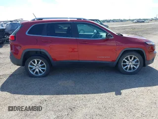 2014 Jeep Cherokee Limited with VIN 1C4PJMDB7EW165272, listed as a IAAI auction lot 35106260 with 102,934 mi miles and . Bid and sale history available at DreamBid. Image 13.