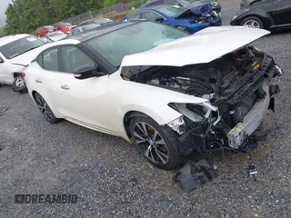 2018 Nissan Maxima SL with VIN 1N4AA6AP4JC394012, listed as a IAAI auction lot 42255180 with 112,006 mi miles and . Bid and sale history available at DreamBid. Image 1.
