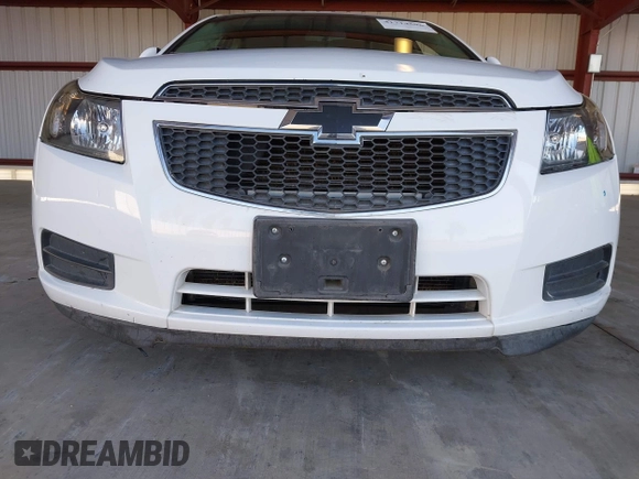 2014 Chevrolet Cruze 1LT with VIN 1G1PC5SB7E7298751, listed as a IAAI auction lot 41714596 with 94,864 mi miles and . Bid and sale history available at DreamBid. Image 16.