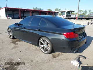 2014 BMW M5 z VIN WBSFV9C54ED593281, wystawiony jako IAAI lot #42063656 z przebiegiem 104 517 mil mil oraz . Historia ofert i sprzedaży dostępna na DreamBid. Obrazek 3.