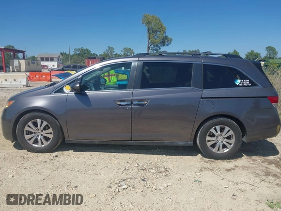2015 Honda Odyssey EX-L with VIN 5FNRL5H61FB048170, listed as a IAAI auction lot 41822798 with 179,550 mi miles and . Bid and sale history available at DreamBid. Image 14.