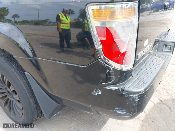 2007 Honda Ridgeline RTL w/Leather with VIN 2HJYK16527H515539, listed as a IAAI auction lot 42100067 with 186,864 mi miles. Bid and sale history available at carsss.com. Image 6.
