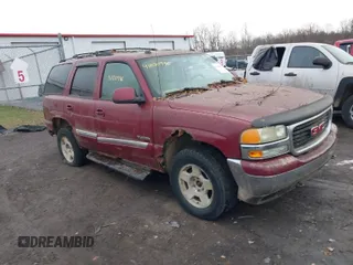 2005 GMC Yukon SLT with VIN 1GKEK13T85R206590, listed as a IAAI auction lot 41100996 with 1 mi miles. Bid and sale history available at carsss.com. Image 1.