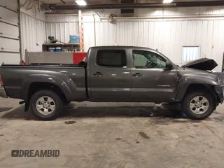 2013 Toyota Tacoma with VIN 3TMMU4FN9DM052987, listed as a IAAI auction lot 42325979 with 200,379 mi miles and . Bid and sale history available at DreamBid. Image 13.