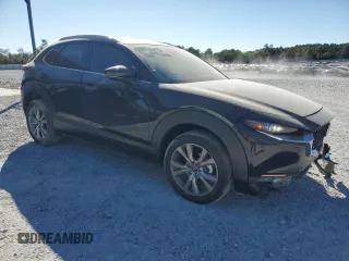 2020 Mazda CX-30 Premium with VIN 3MVDMAEM4LM137806, listed as a Copart auction lot 76620304 with 65,071 mi miles and Salvage title. Bid and sale history available at DreamBid. Image 4.