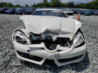 2010 Mercedes-Benz SLK 300 z VIN WDBWK5EA6AF230979, wystawiony jako Copart lot #55562665 z przebiegiem 56 754 mil mil oraz Szkody całkowita. Historia ofert i sprzedaży dostępna na DreamBid. Obrazek 5.